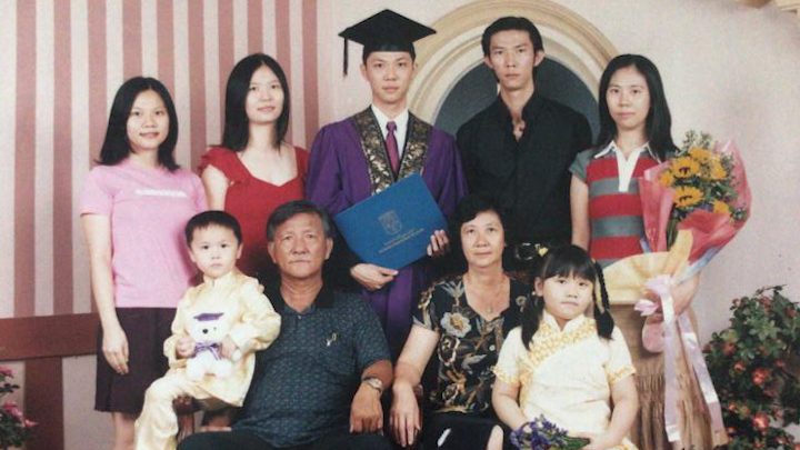 Beng Hock and his family pictured after his graduation