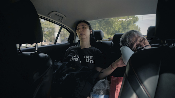 Lee Jun and her father, driving home after offering prayers at Beng Hock’s shrine.