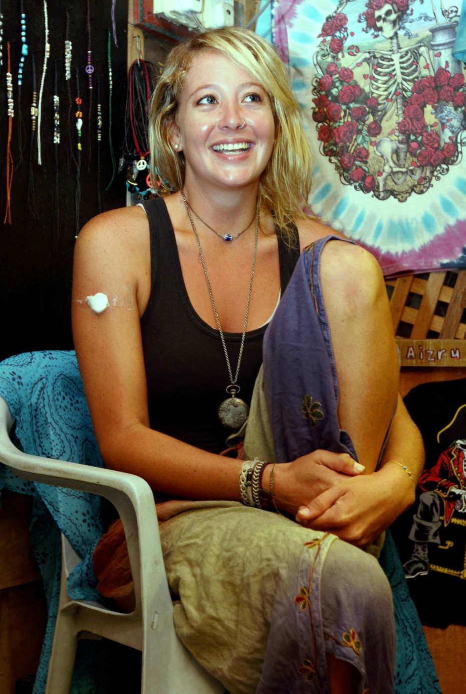 When we met Burger in Langkawi, she was sitting behind a stall on Cenang beach selling trinkets. The stall belonged to one of her newfound Malaysian friends, and she was helping him out for free. When she isn't at the stall, she's usually performing with local bands and buskers.